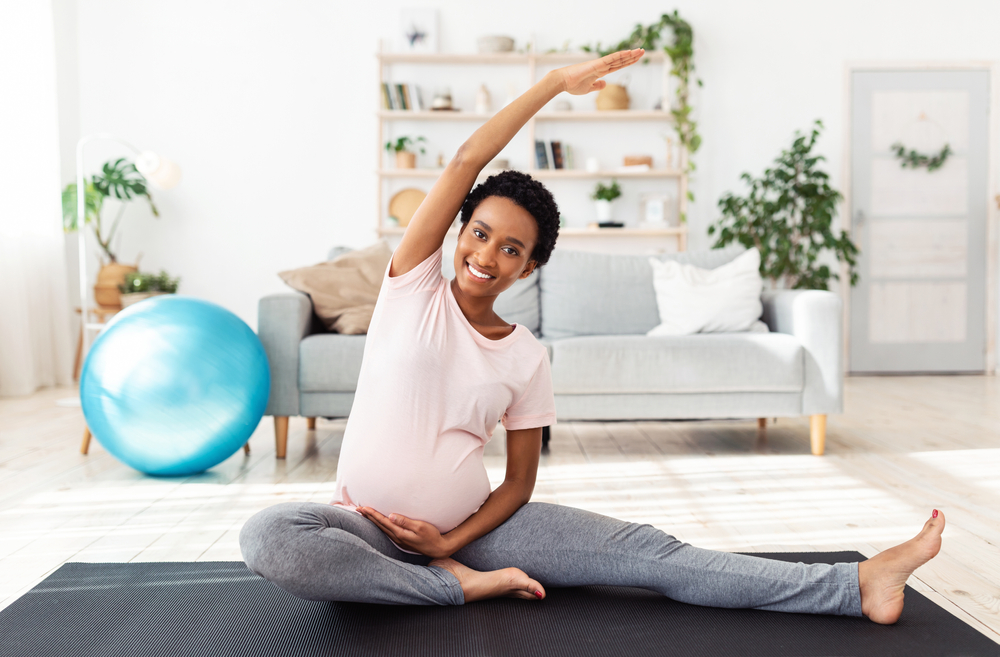 Pregnant woman working out.