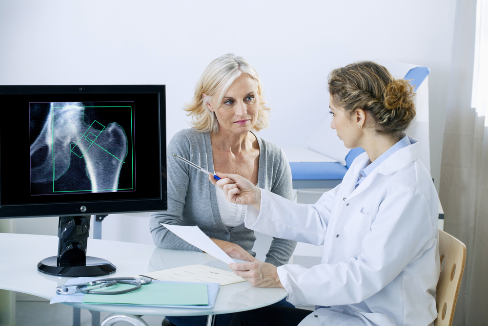 woman getting a bone density screening