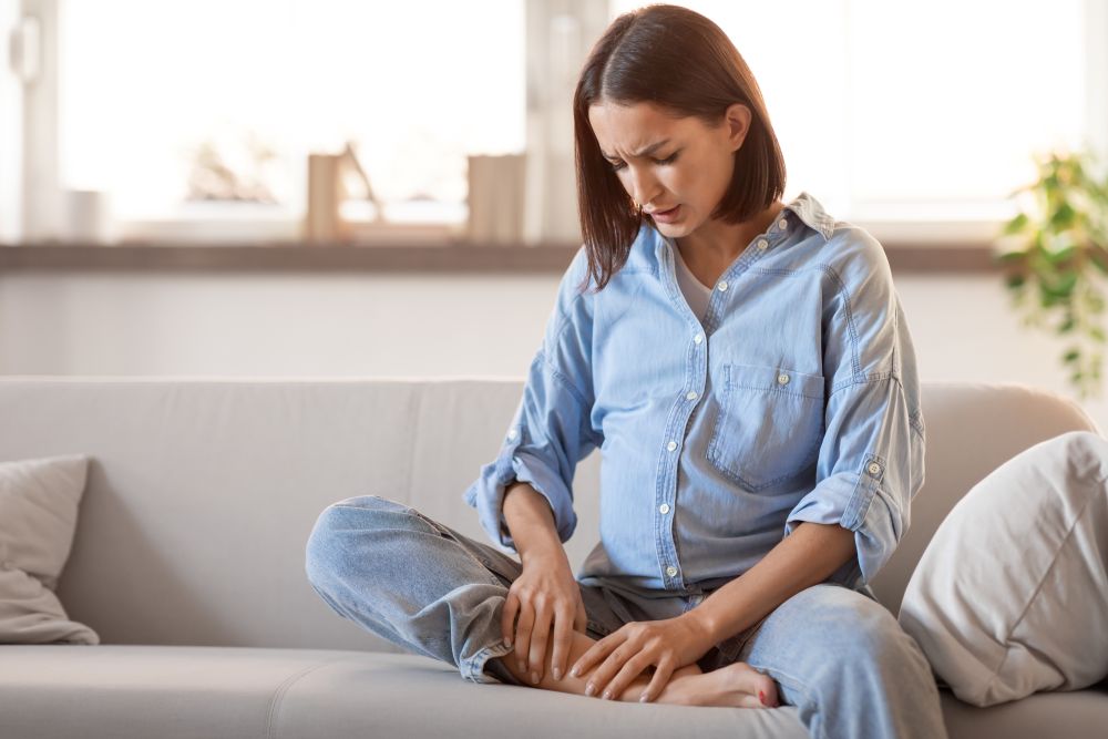 woman sitting on couch
